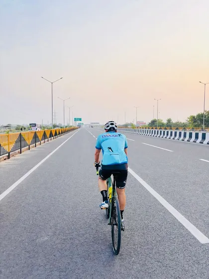 Riding into the sunrise on an open expressway. There's a unique peace and freedom in these early morning rides before the city wakes up.