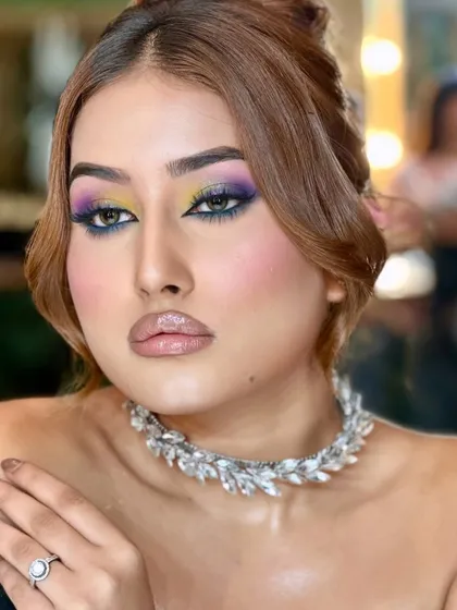 Another angle of these celestial eyes, showing the blend of purple and yellow on the lid.