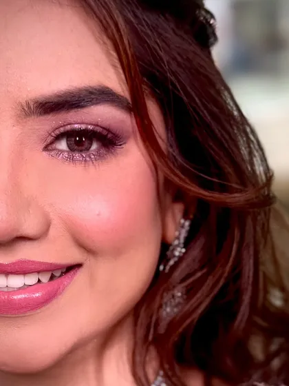 An extreme close-up of the mauve eye makeup. I used shimmering mauve and pink tones to create a look that is soft, girly, and bubbly, yet full of glam and shine.