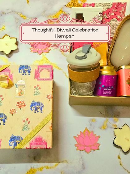 A closer look at the Thoughtful Diwali Celebration Hamper, highlighting the sustainable mug, candle, and other eco-conscious items inside.