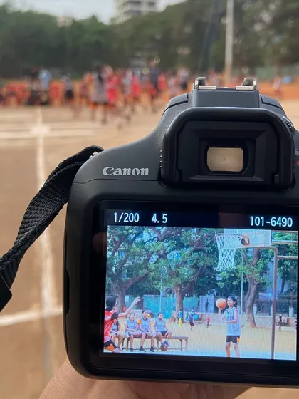 A behind-the-scenes look from our photographer's camera, capturing the action on the court. We make sure your highlight moments get snapped.
