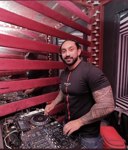 A shot of me at the console, with the unique wall design of the club in the background. I've played at some of the most stylish venues.