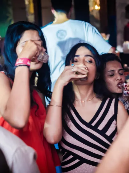 A round of shots to keep the party going. My events are known for their lively bar scene and fun-loving crowd, making it the perfect spot for a girls' night out.