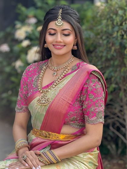 A beautiful outdoor portrait of the bride. The makeup is designed to look stunning in natural light, with a focus on glowing skin.