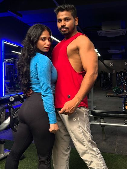 A powerful pose with my partner. We are committed to our fitness and to each other.