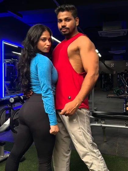 A powerful pose with my partner. We are committed to our fitness and to each other.