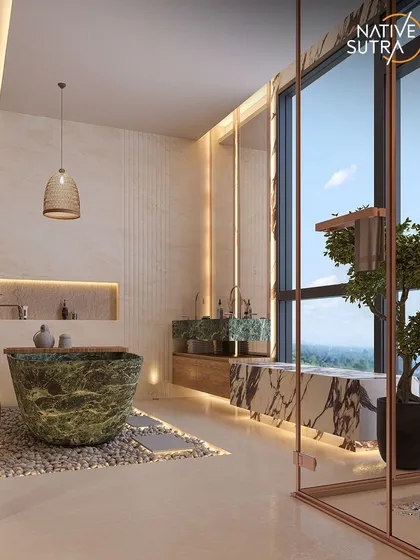 We design bathrooms to be personal sanctuaries. This Zen-inspired space features a stunning green marble bathtub, a floating marble vanity, and soft, ambient lighting. Every element is chosen to create a spa-like experience that promotes calm and rejuvenation.
