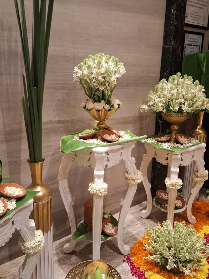 The beautiful floral decor at the entrance of the Southern Spice pop-up, featuring tuberoses and traditional elements.