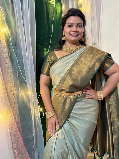 This is the same outfit and jewellery, showing how versatile it is for different poses. The rich gold finish looks beautiful against the saree.