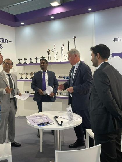 Our leadership and sales team in a lively discussion with visitors at EIMA 2022, sharing insights into our impact and micro-sprinkler technologies.