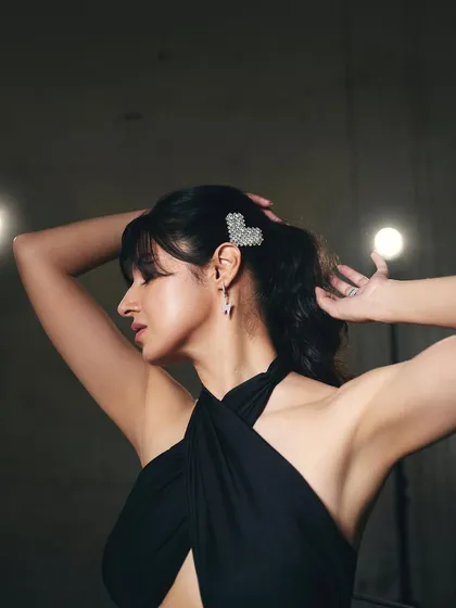 A detail shot from the 'Yaariyan 2' promotional styling, focusing on the hair accessories and jewelry. Every element is chosen to complement the overall edgy aesthetic of the outfit.