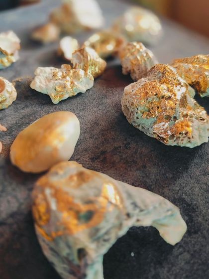 We find beauty everywhere. These are sea shells and stones collected from the beach, gilded with gold leaf by the "Humsafars" of Haan Hum. It’s a practice of seeing the value in what is often overlooked.