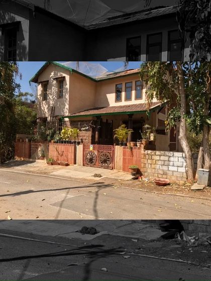 A duplicate of 153, this image shows the charming, traditional-style exterior of the Padmaja Rao Residence.