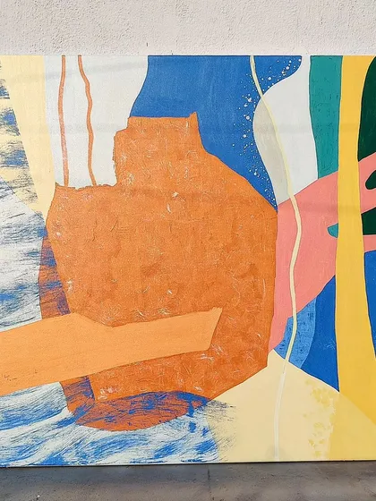 There's no such thing as too many colors. This large abstract canvas is all about energy and expression, layering bright orange, blue, yellow, and pink in a dynamic composition that brings life to a plain wall.