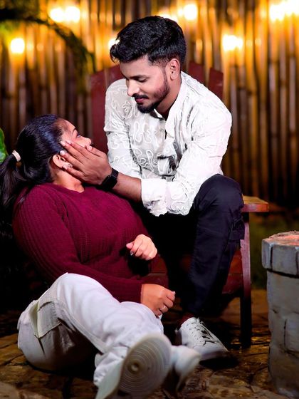 A tender moment between the couple. Even casual, coordinated outfits can look great for a pre-wedding album.