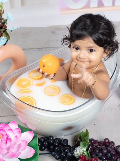 A sweet milk and orange bath, with 'hunny' pots and a lotus flower adding to the charm.