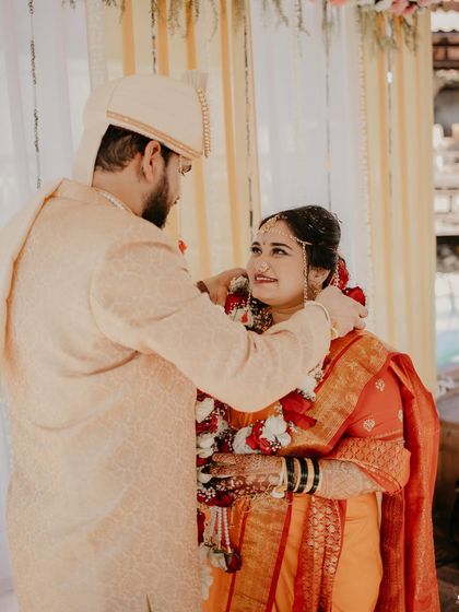 A candid moment from a wedding ceremony. The makeup is designed to be long-lasting and picture-perfect, even through the most emotional moments.