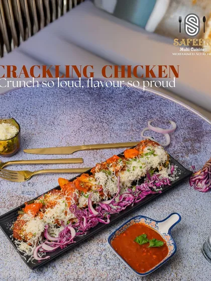 Our Crackling Chicken is a house favorite, known for its incredibly crunchy exterior and tender, juicy chicken inside. Served on a bed of crisp shredded cabbage and topped with grated cheese, it's a textural and flavorful starter perfect for any occasion.