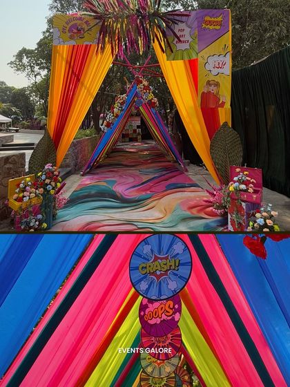 The entrance to the Haldi was a triangular tunnel of colorful drapes with pop-art signs, leading guests down a custom-printed psychedelic pathway. It was an immersive start to a fun-filled event.