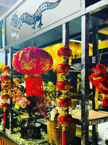For an authentic Asian cuisine station, I use thematic decor like Chinese lanterns and dragon motifs. These details transport guests and enhance the overall dining experience.