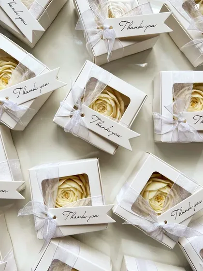 A simple 'Thank you' tag is all you need to turn these beautiful peony candles into the perfect favor for any event.