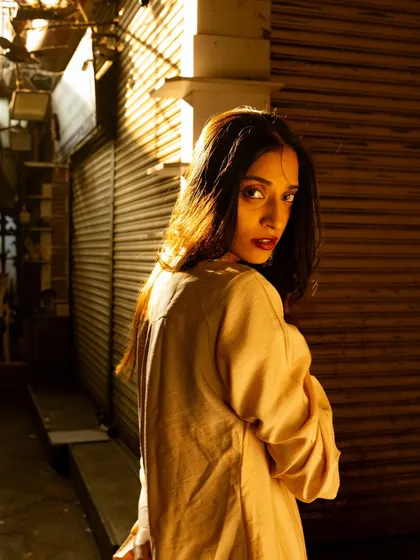 Playing with the golden hour light in a narrow alley. The strong sidelight creates beautiful highlights and shadows, adding drama to the shot.