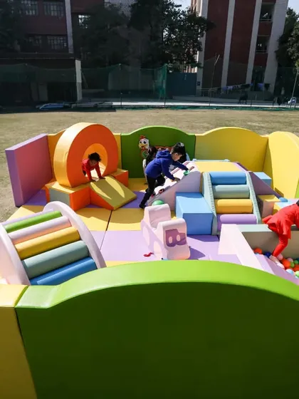 An overhead view of the action. You can see how the different elements like the donut tunnel, slide, and ball pit are arranged to create a circuit of non-stop fun.