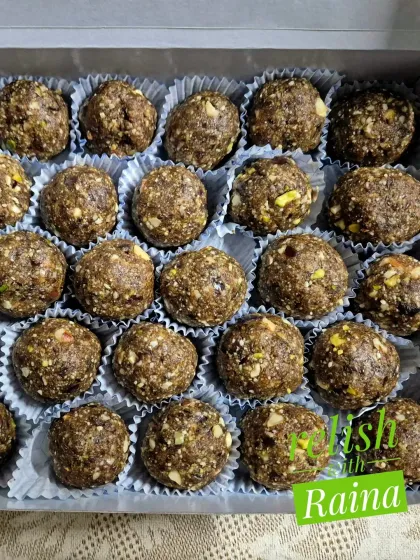 A close-up of the coarsely ground Dry Fruit Laddoos. You can see the finer texture which still retains the crunch and flavor of roasted nuts.