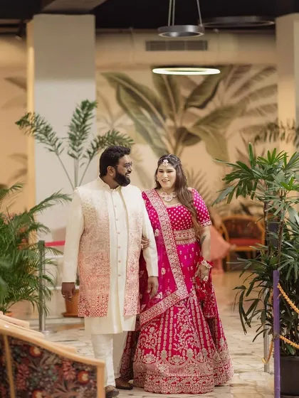 A loving glance between the couple at their Sangeet. We coordinate with the photo team to capture these candid moments of connection throughout the festivities.