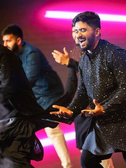 Pure energy and expression from the groom and his friends during their power-packed performance.