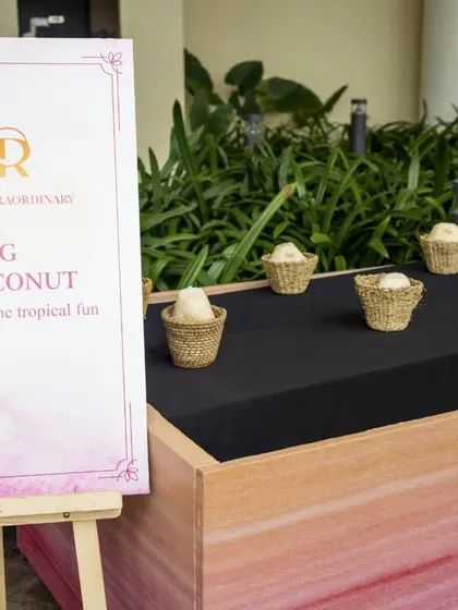 A fun, tropical-themed game station for "Ring the Coconut," adding an element of playful competition to the wedding festivities.