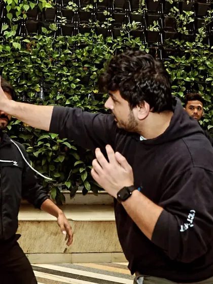 The open-hand palm strike is a versatile and safe tool. It allows you to strike vulnerable targets like the nose or chin with full force without risking breaking the small bones in your hand.