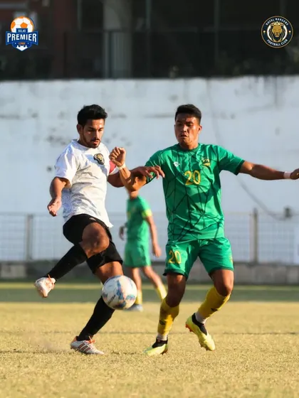 A physical challenge for the ball, demonstrating the grit and fight in our team.