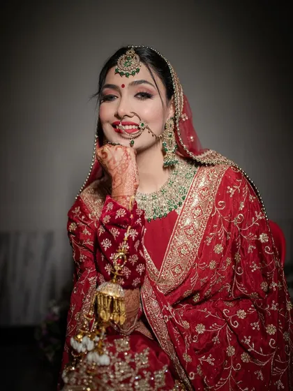 The pure joy of a Punjabi bride. I absolutely adore creating these vibrant looks for Anand Karaj ceremonies, complete with the traditional red suit, beautiful kaleeras, and a smile that lights up the room.
