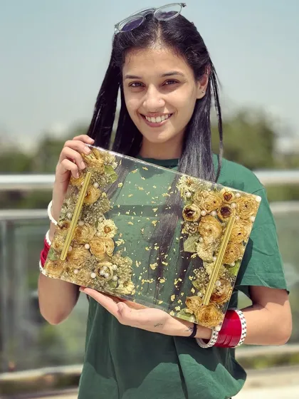 Holding up the finished tray. It's lightweight yet sturdy, and the preserved flowers look so delicate inside.