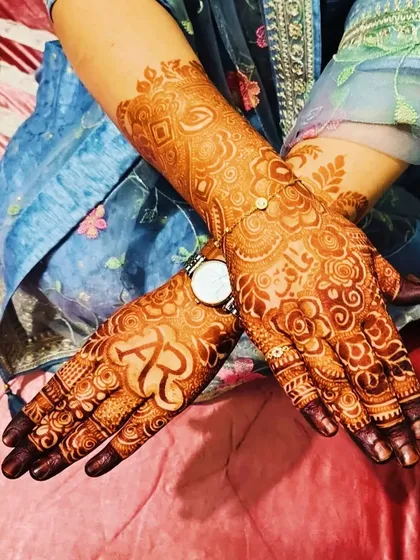 A beautiful stained design with the initials 'AR' and the name 'Faizan' clearly visible.