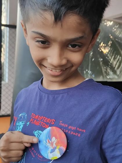 Another one of our star boys showing his reward after a productive day on the mats. These small achievements build a strong sense of accomplishment for our young martial artists.