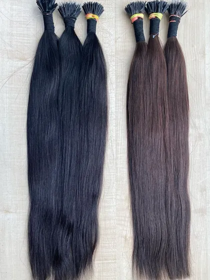 A side-by-side view of our black and brown I-Tip extensions, perfect for creating custom color blends.