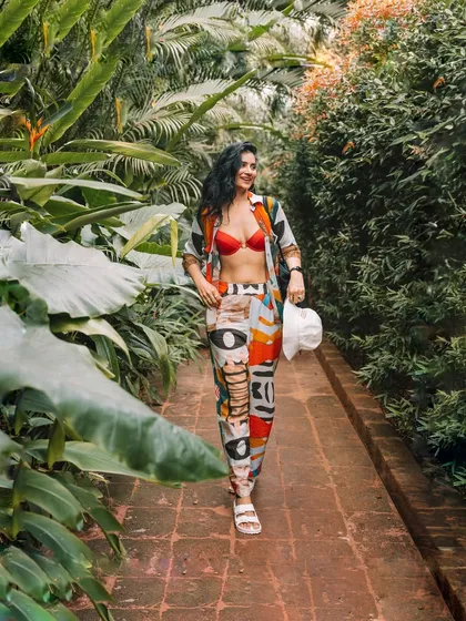 Walking through a beautiful green pathway in Goa. I love finding these hidden, picturesque spots during my travels.
