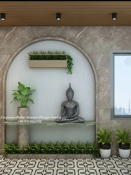 Creating a sense of peace is important in any home. I designed this tranquil corner on a balcony, featuring a Buddha statue set within a marble-clad arch. The integrated planters and soft lighting make it a serene space for meditation or quiet reflection.