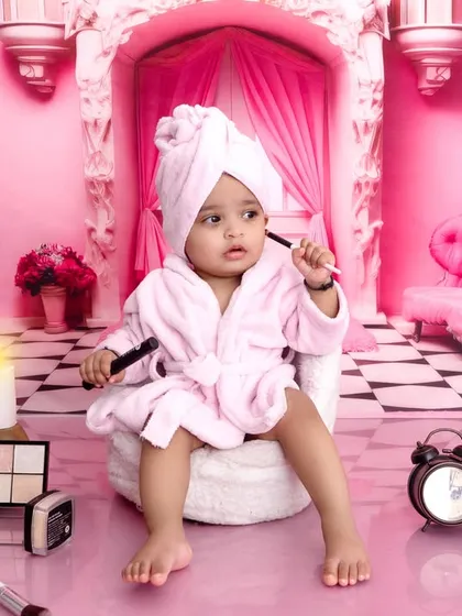 A fun and fabulous 'spa day' themed shoot for a little diva. This is a perfect example of how I use creative props and detailed setups in my Gurgaon studio to create unique and imaginative portraits for your child.