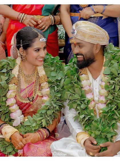 A shared smile between the bride and groom, surrounded by the beauty of their wedding ceremony. It is these simple, happy exchanges that I love to document.