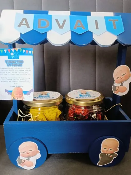 Who's the boss? The birthday boy, of course! I had so much fun creating this 'Boss Baby' themed gift cart, personalized with the birthday boy's name. It shows how I can take any party theme and turn it into a unique and memorable return gift.