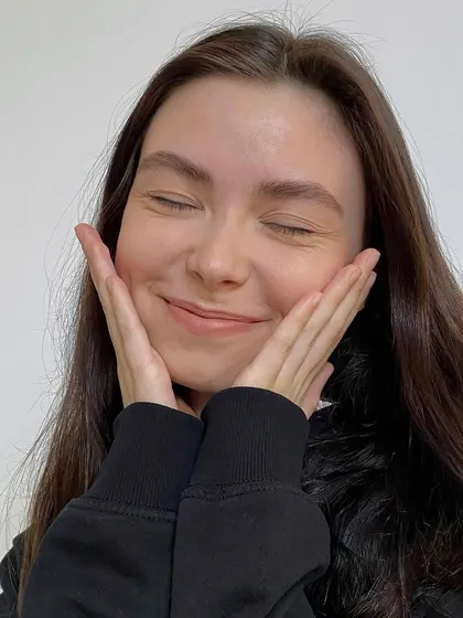 The joy on a client's face says it all. This is the result of a master-level eyebrow coloring and correction, a skill we teach in our advanced training.