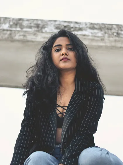 A confident portrait from the promotional shoot for my original song, "Tasveer." This image captures the bold and modern energy I bring to my personal brand and my Hindi R&B music.