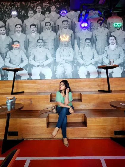 A casual day out in Dehradun. A simple green top and jeans are perfect for a relaxed family outing.