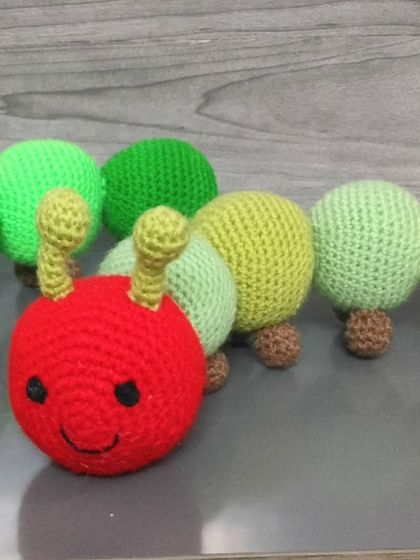 The smiling face of my crochet caterpillar.