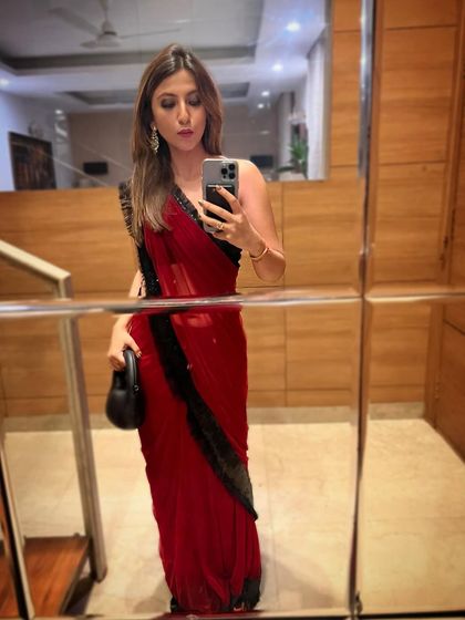 A selfie showing the details of my red and black saree. The right accessories can complete any look.