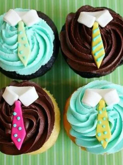 Another look at our dapper Father's Day cupcakes, featuring colorful edible ties on swirls of chocolate and turquoise frosting.
