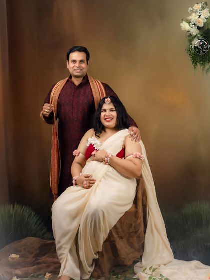 A lovely couple's portrait in the Shaakunthalam series, capturing a regal and serene moment together.